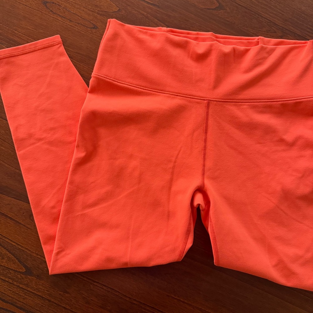 Fabletics PowerHold High Waisted Strappy Back Leggings Neon Coral Orange 7/8 M